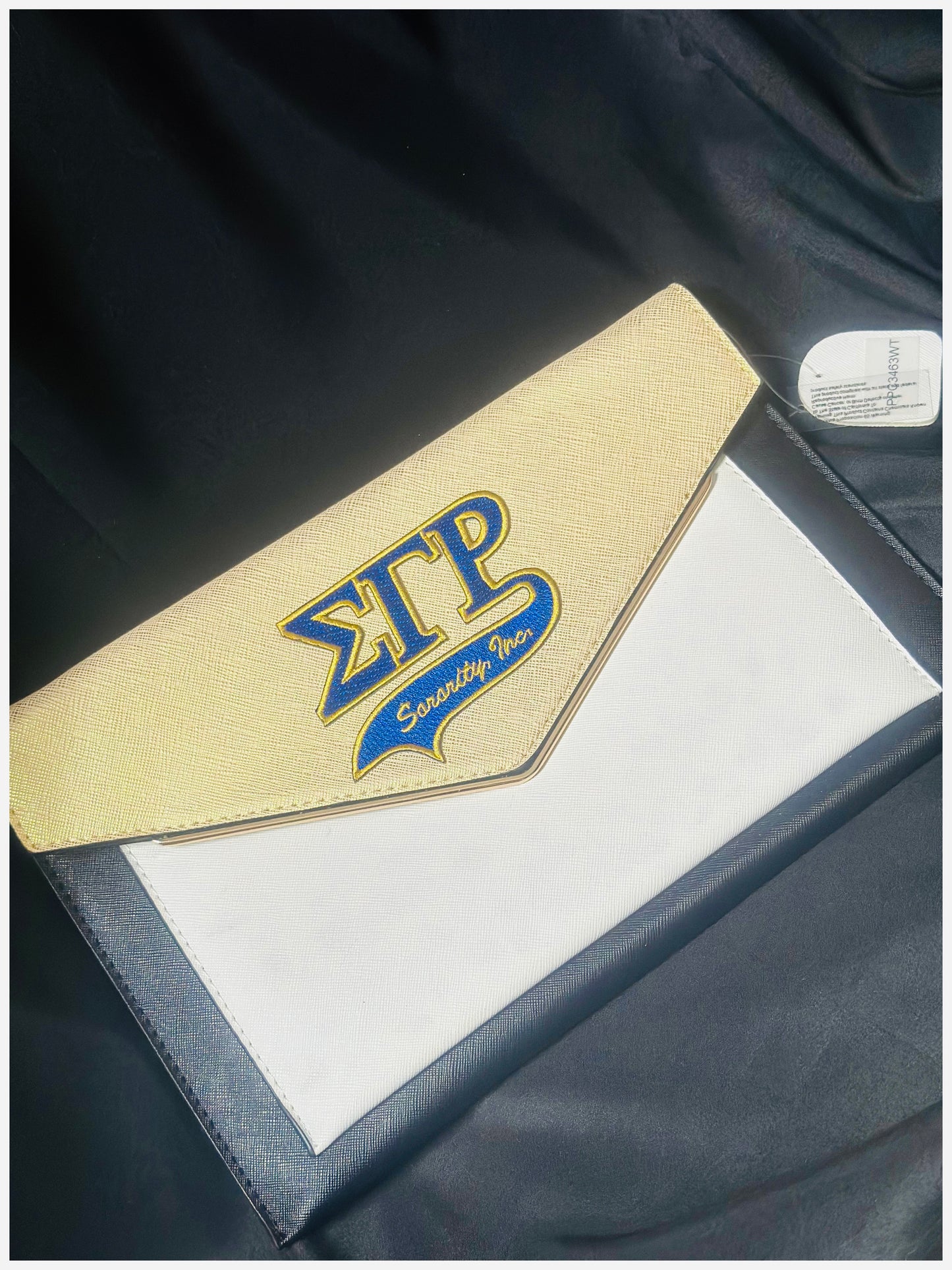 SGRho inspired envelope clutch