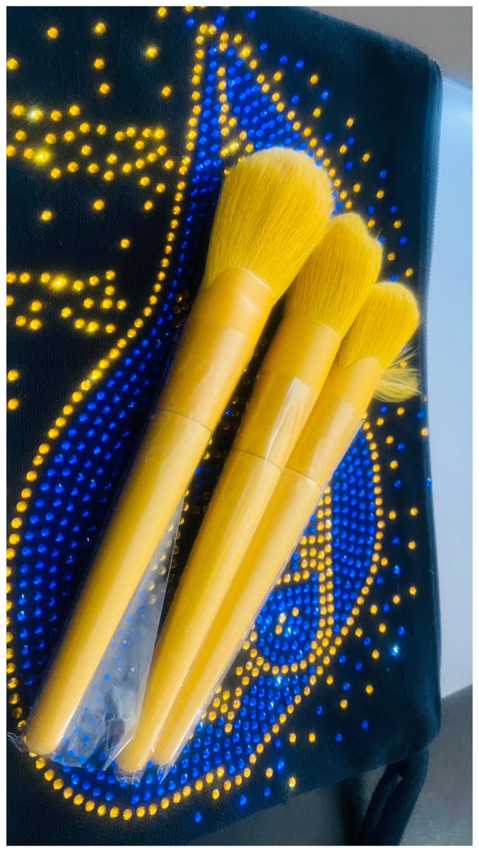 Golden make up brushes